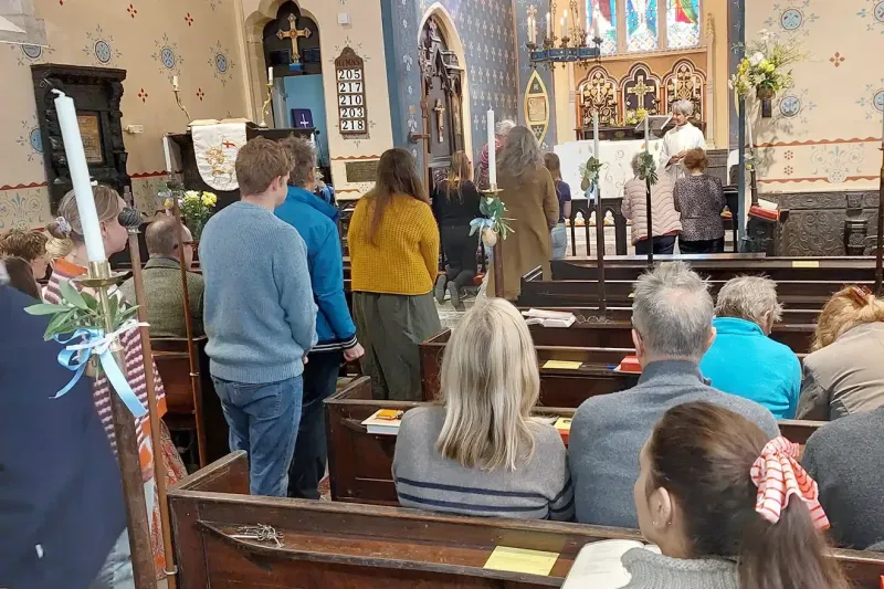 Congregation in line to take Communion