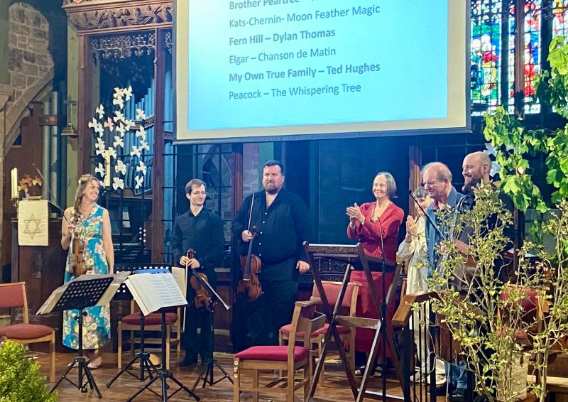 Photograph taken of the performers taking their bow at the end of the concert.